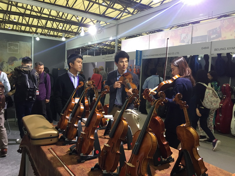 Lien Violins instrument display at booth E4B47